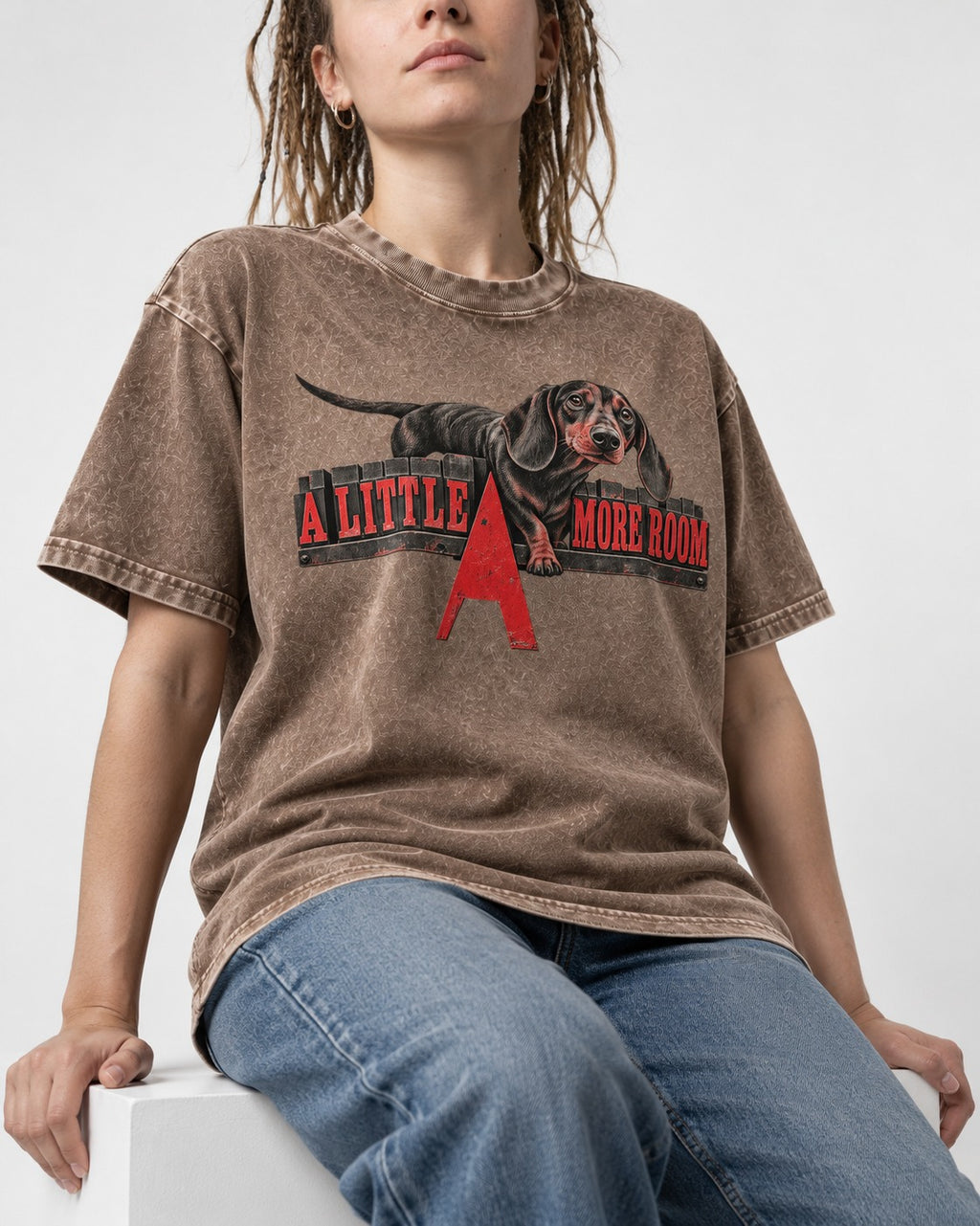 More Room for Dachshund Washed Tee in Coffee, worn by a seated model