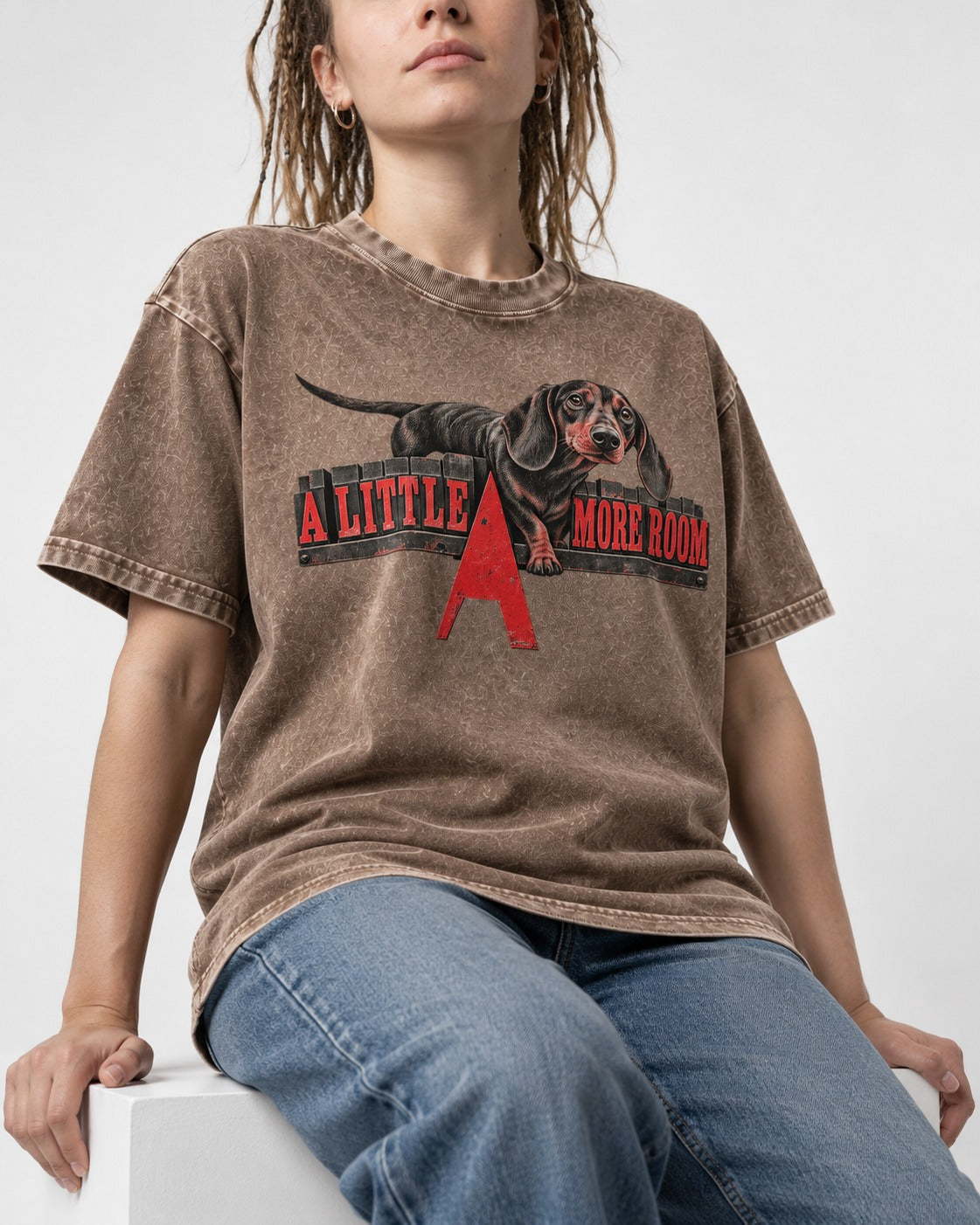 More Room for Dachshund Washed Tee in Coffee, worn by a seated model