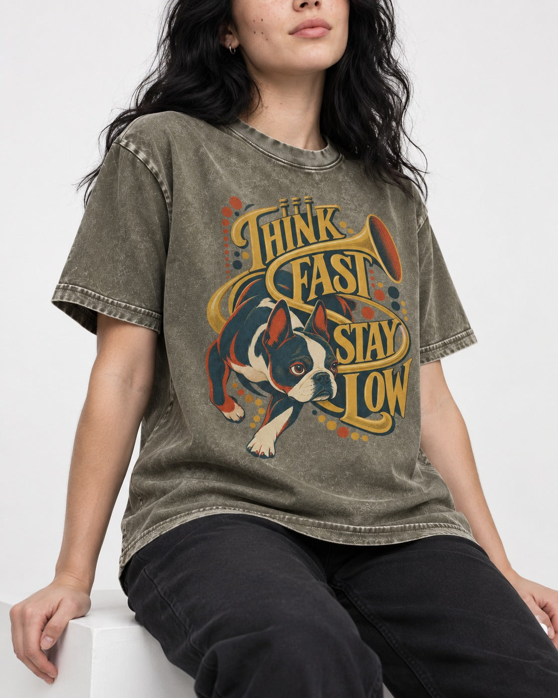 Boston Terrier Think Fast Stay Low Washed Tee in Army Green, worn by a seated model