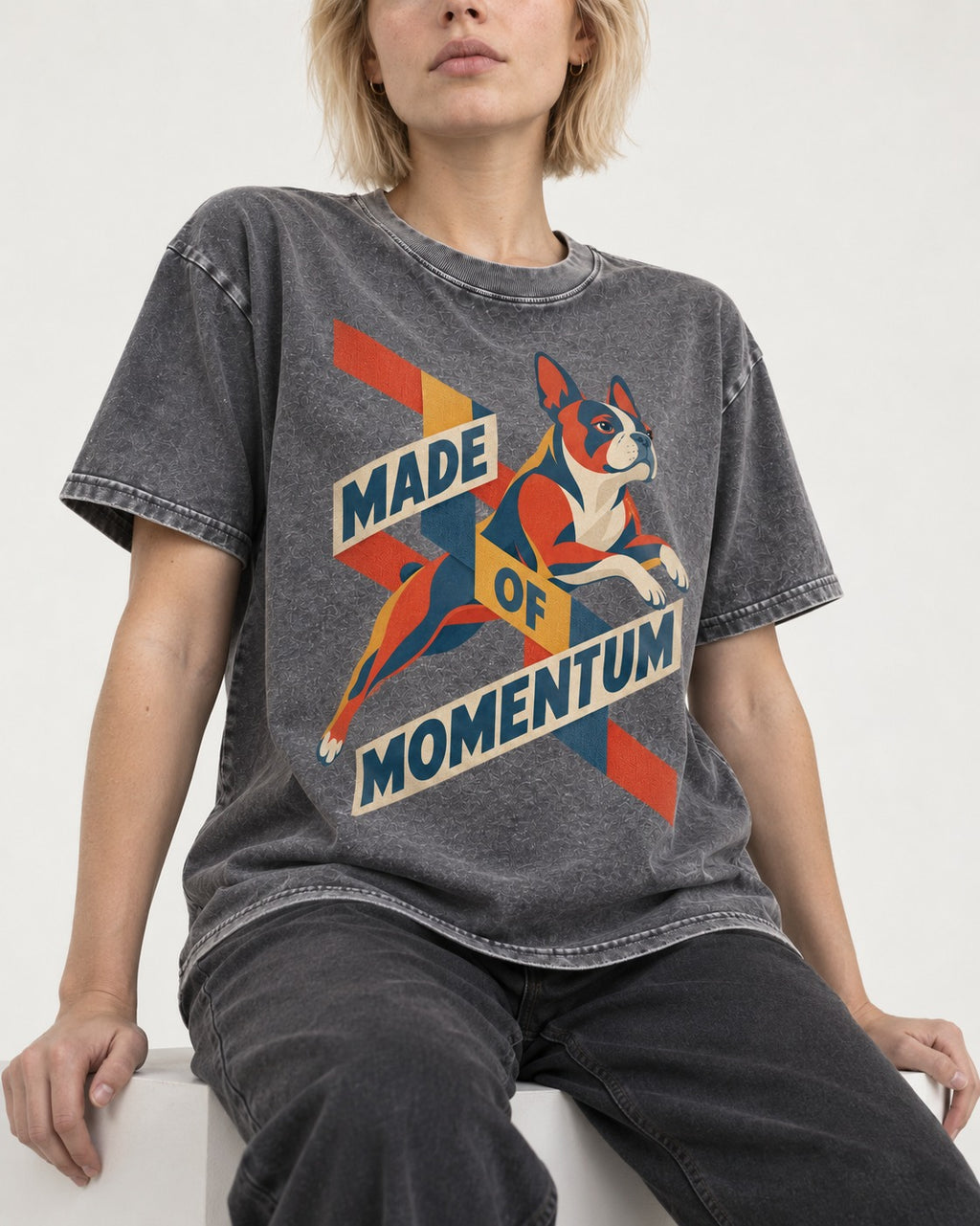 Made of Momentum Boston Terrier Washed Tee in Gray, worn by a seated model