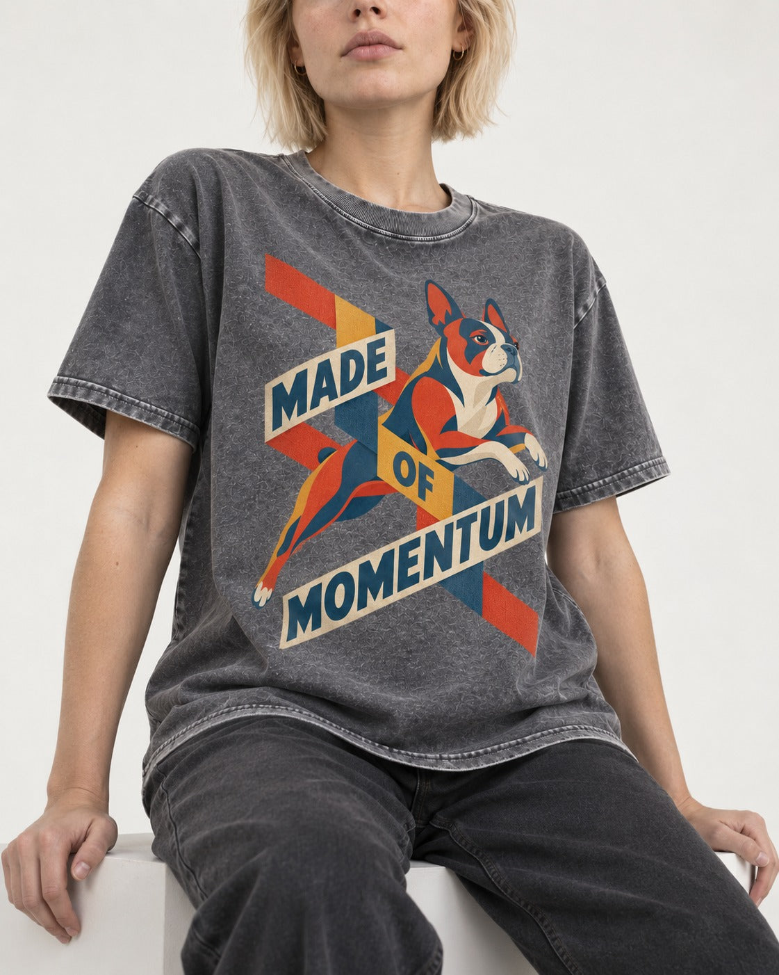 Made of Momentum Boston Terrier Washed Tee in Gray, worn by a seated model