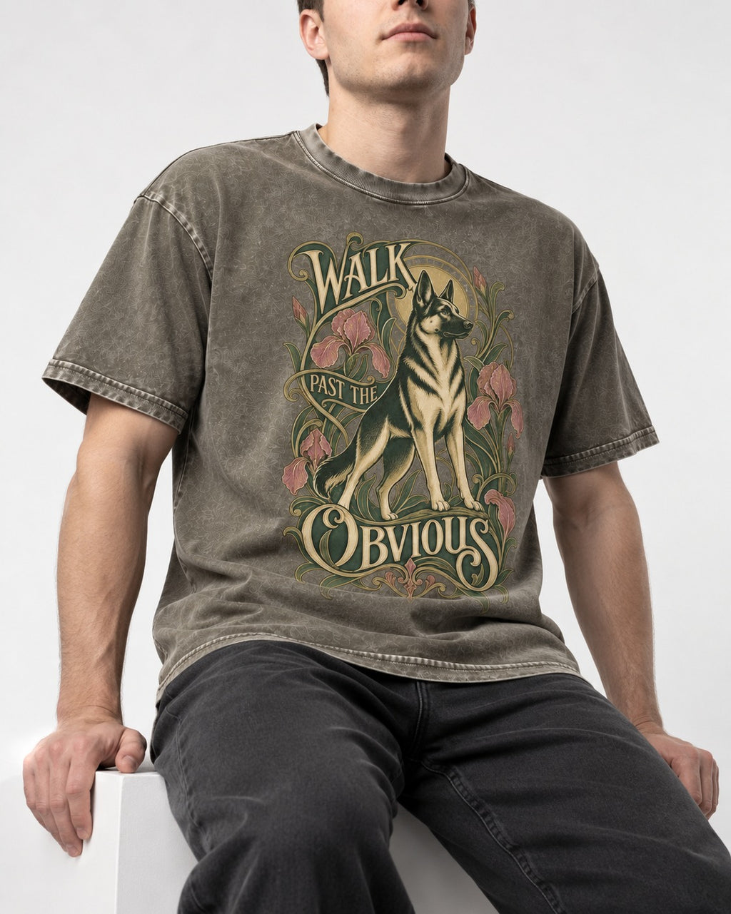 Walk Past The Obvious Art Nouveau German Shepherd Dog Graphic Washed Tee in Army Green, worn by a seated model