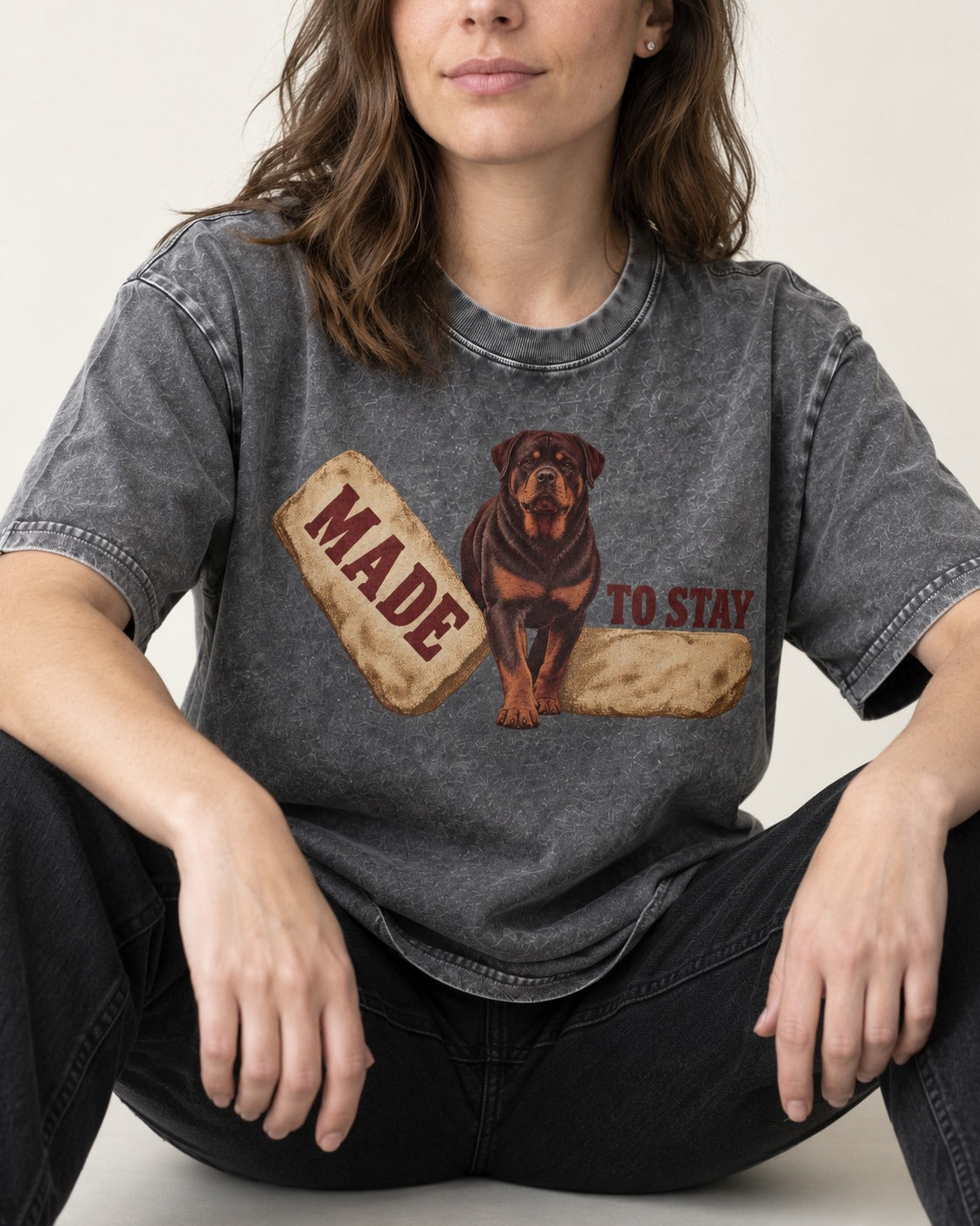 Rottweiler Made to Stay Stepping Stone Graphic Washed Tee in Gray, worn by a seated model
