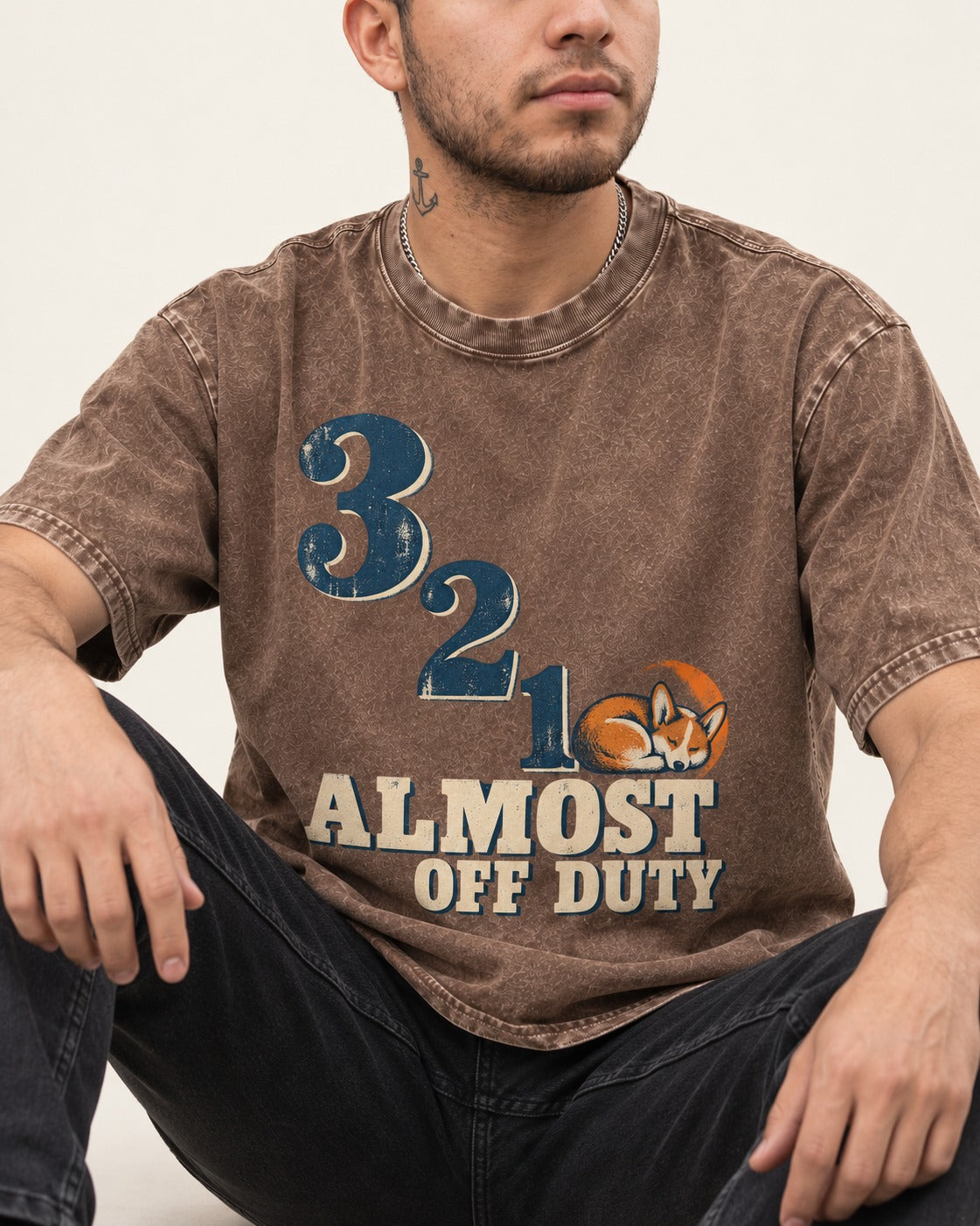 Corgi Almost Off Duty Washed Tee in Coffee, worn by a seated model