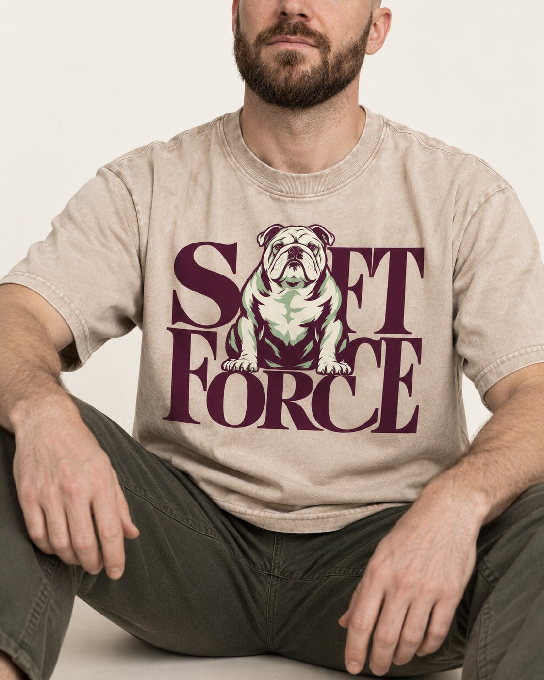 Set Force English Bulldog Washed Tee in Apricot, worn by a seated model