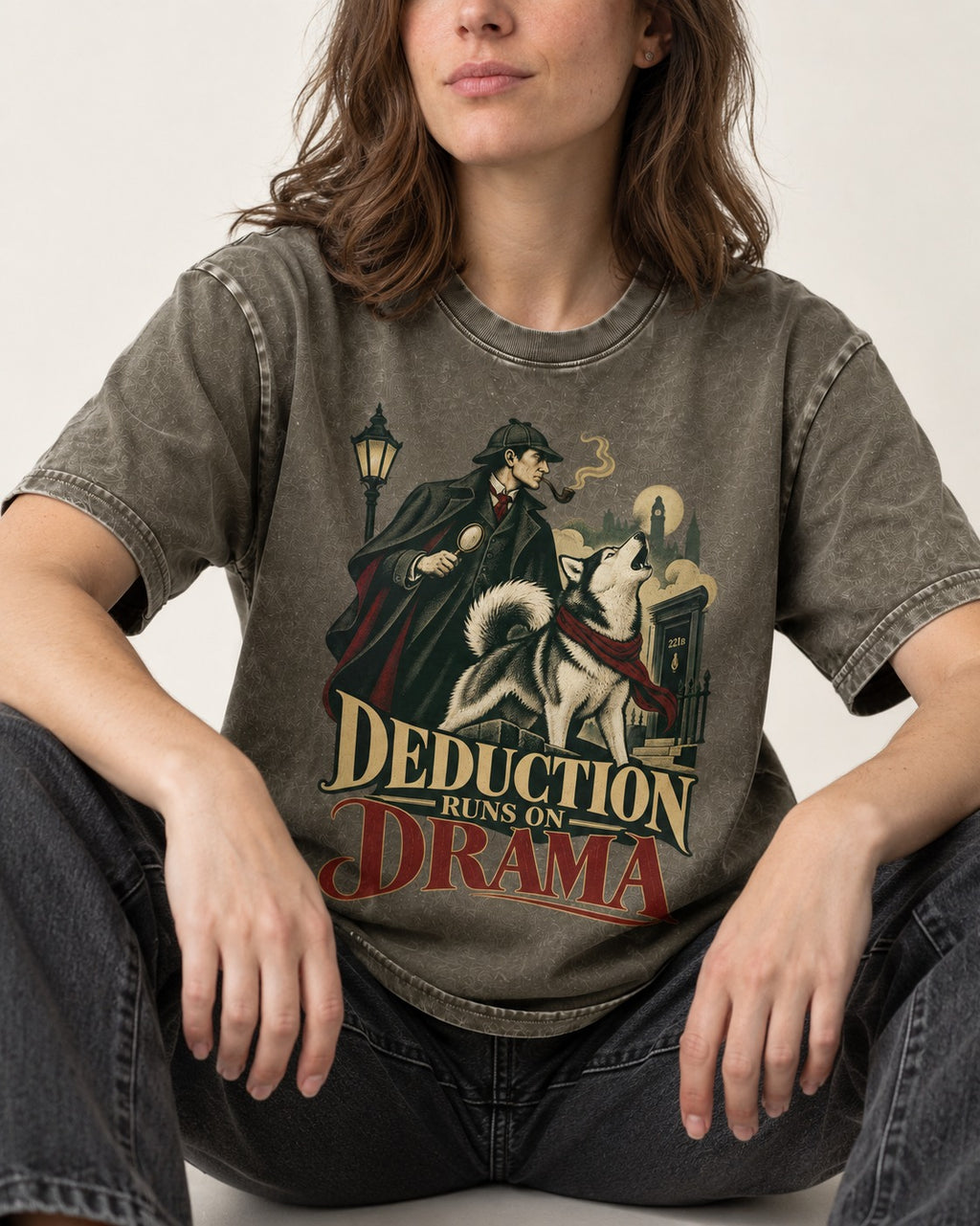 Husky Deduction Runs on Drama Detective Graphic Washed Tee in Army Green, worn by a seated model