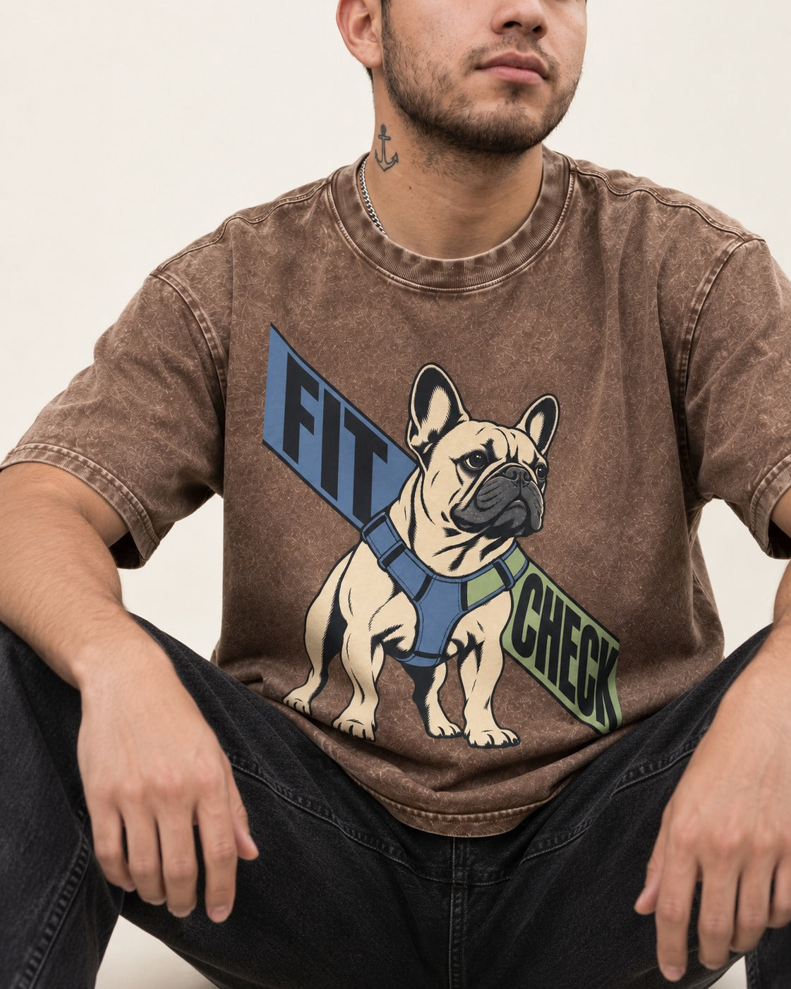 Frenchie Fit Check Washed Tee in Coffee, worn by a seated model