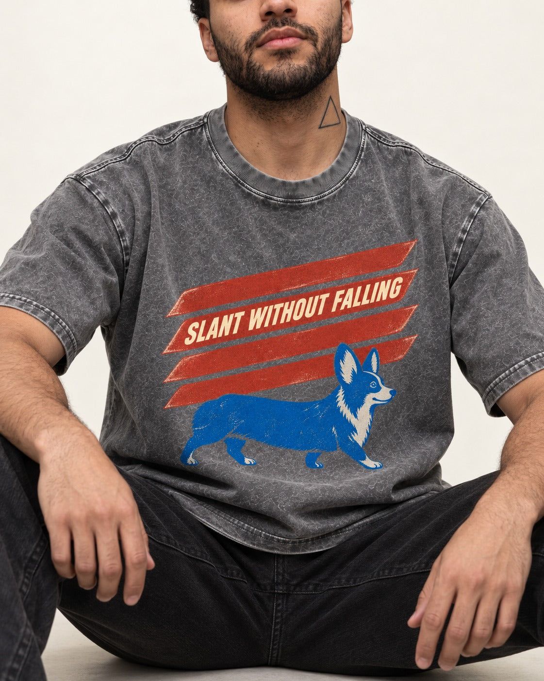 Corgi Slant Without Falling Speed Graphic Washed Tee in Gray, worn by a seated model