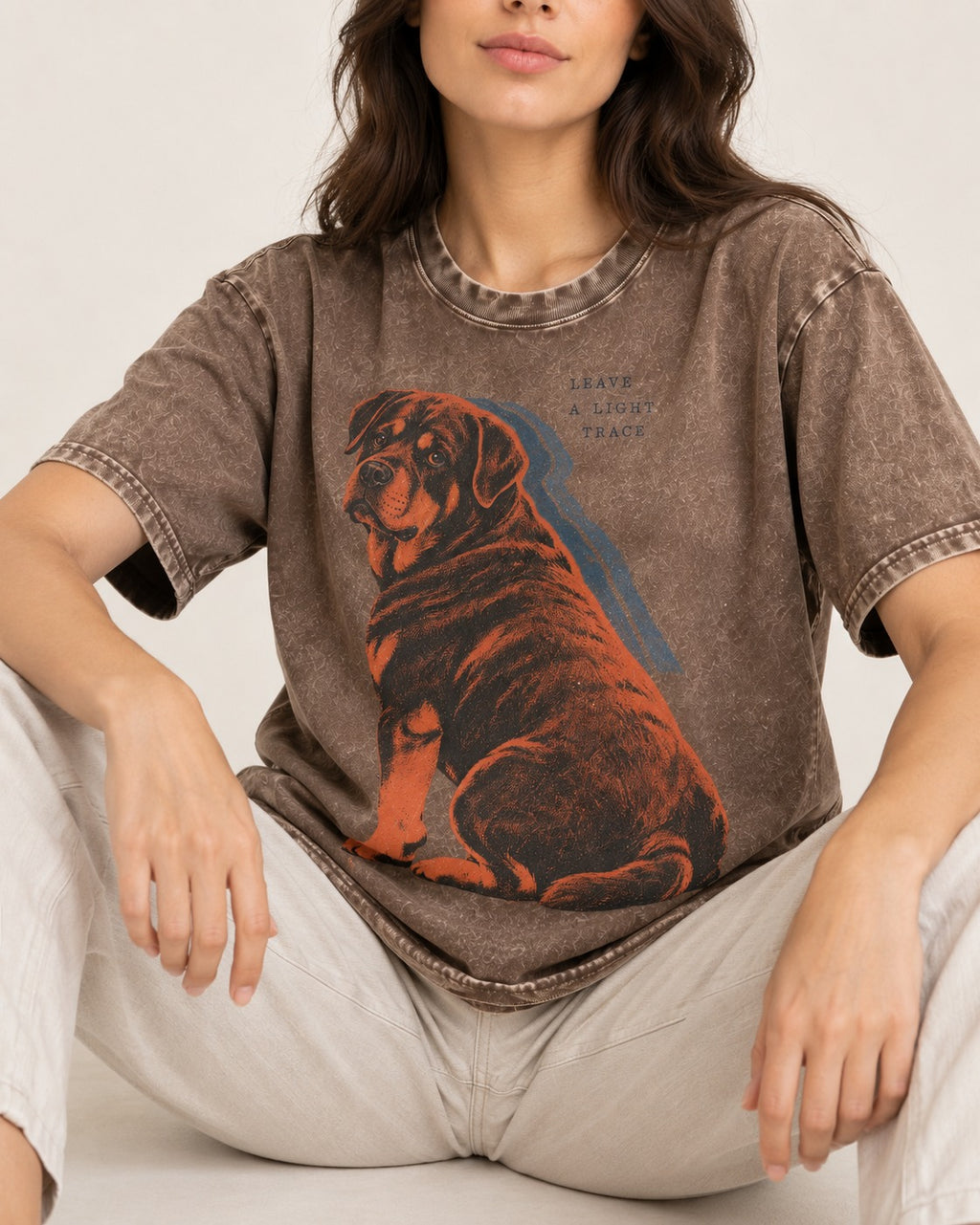 Rottweiler Leave a Light Trace Washed Tee in Coffee, worn by a seated model