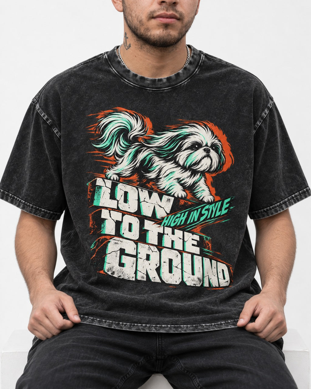 Shih Tzu Low to the Ground High in Style Streetwear Graphic Washed Tee in Black, worn by a seated model