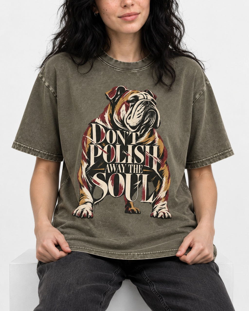 English Bulldog Don't Polish Away the Soul Typography Graphic Washed Tee in Army Green, worn by a seated model