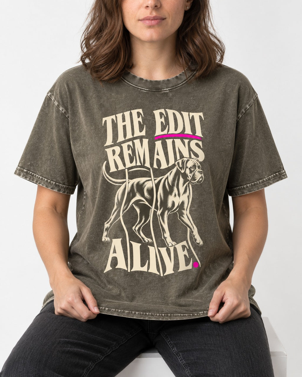 The Edit Remains Alive Boxer Washed Tee in Army Green, worn by a seated model