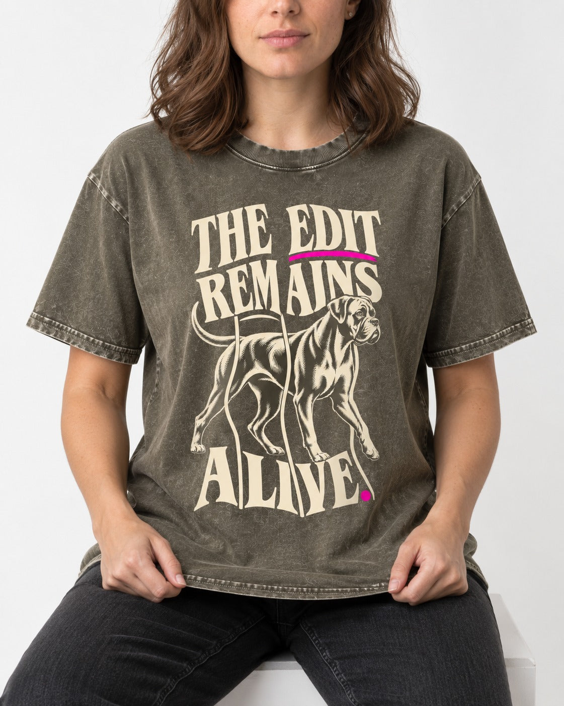 The Edit Remains Alive Boxer Washed Tee in Army Green, worn by a seated model