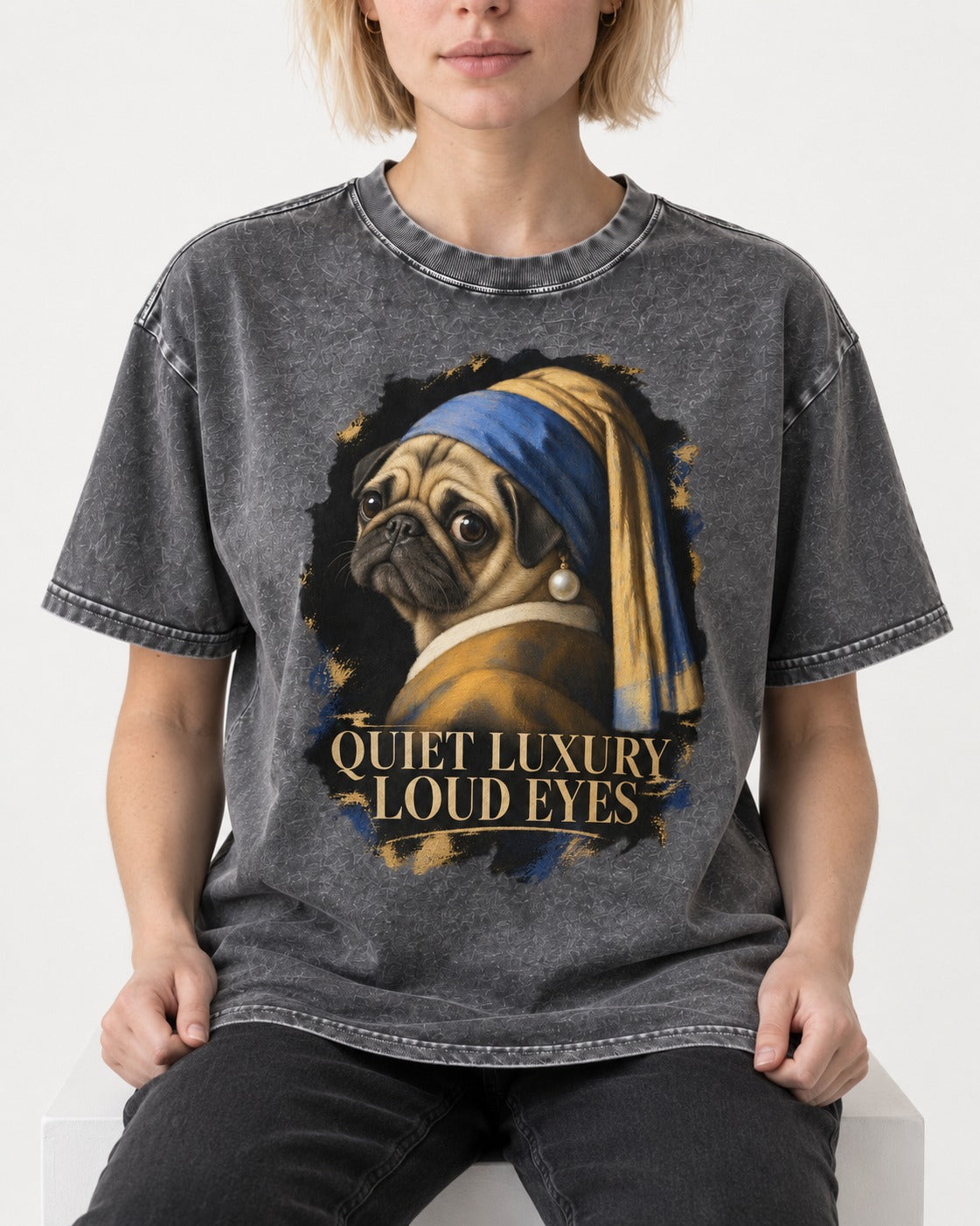 Pug Quiet Luxury Loud Eyes Pearl Portrait Graphic Washed Tee in Gray, worn by a seated model