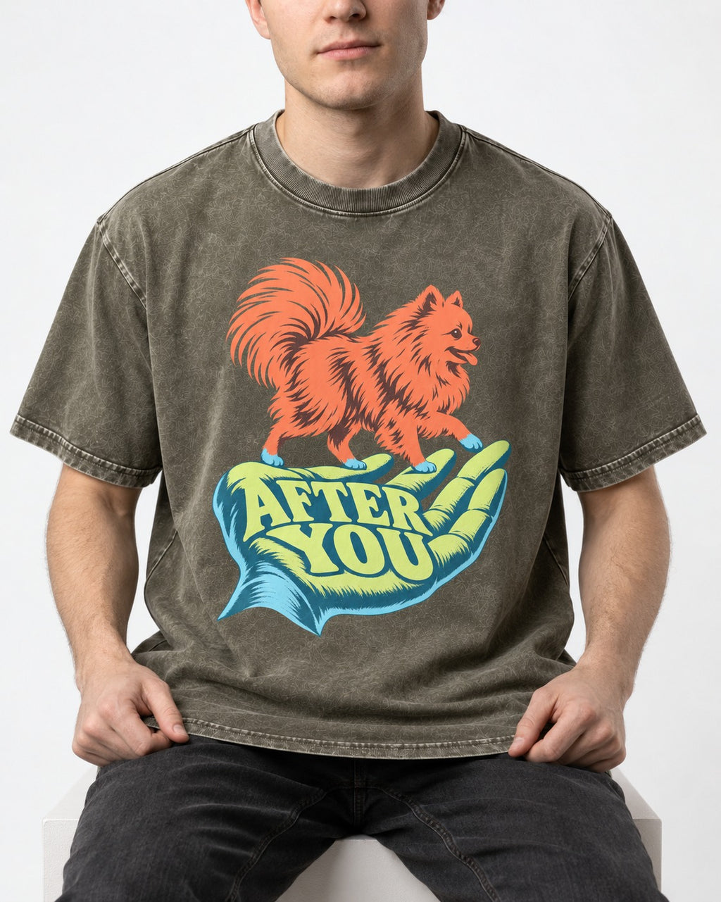Pomeranian After You Helping Hand Graphic Washed Tee in Army Green, worn by a seated model