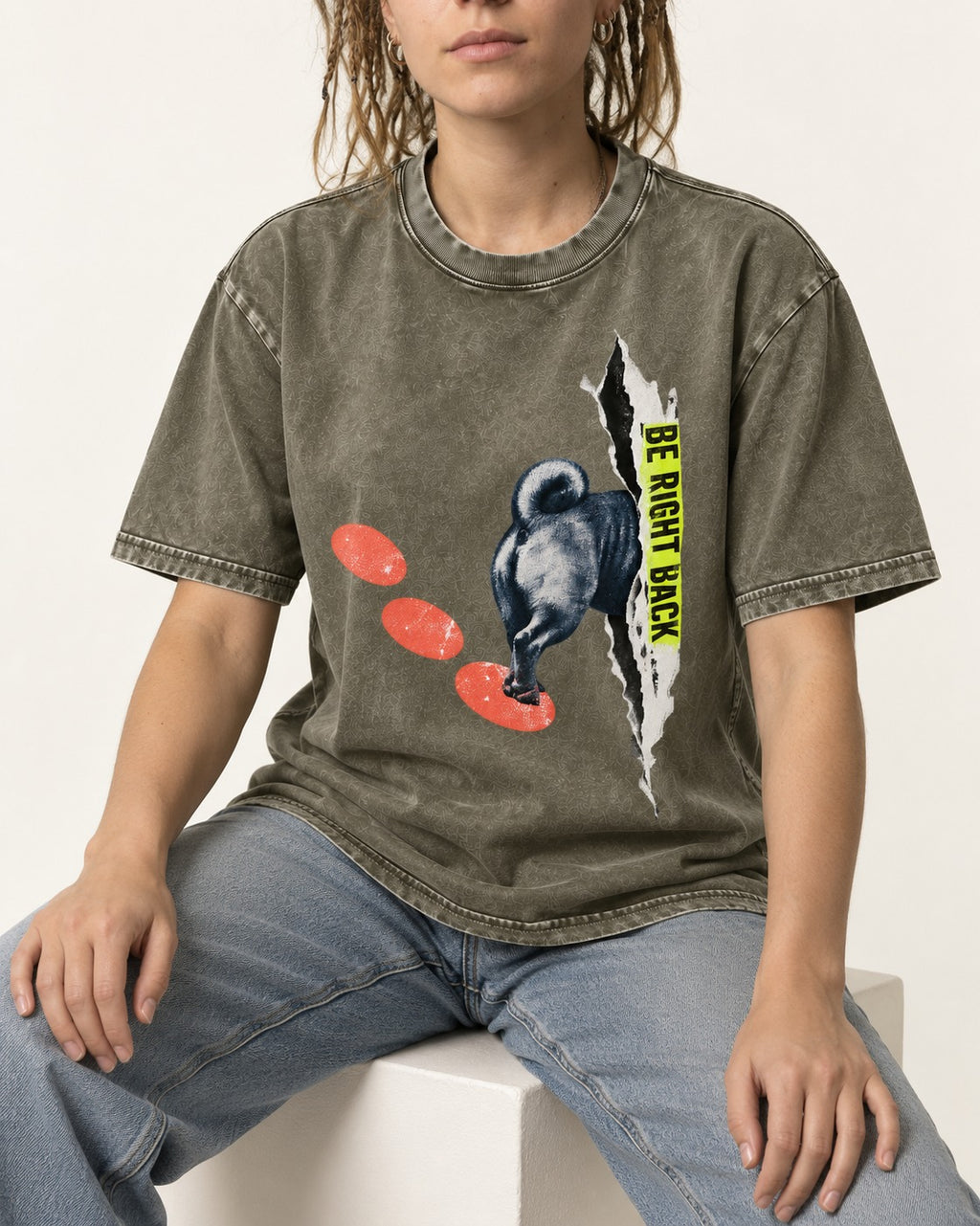 Pug Be Right Back Torn Portal Graphic Washed Tee in Army Green, worn by a seated model