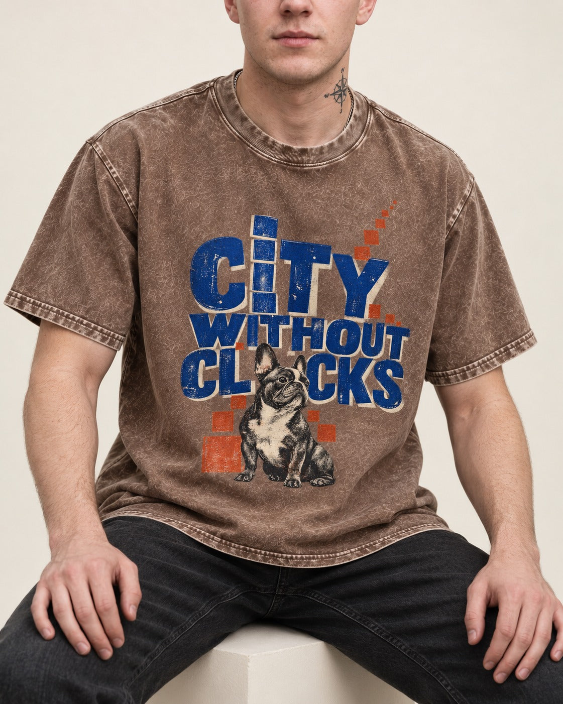 Frenchie's City Without Clocks Washed Tee in Coffee, worn by a seated model