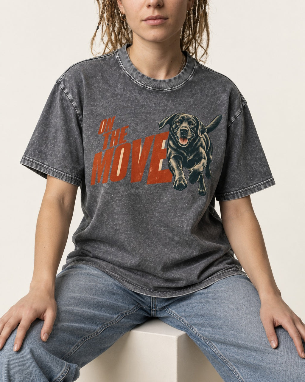 Labrador Retriever On the Move Running Graphic Washed Tee in Gray, worn by a seated model