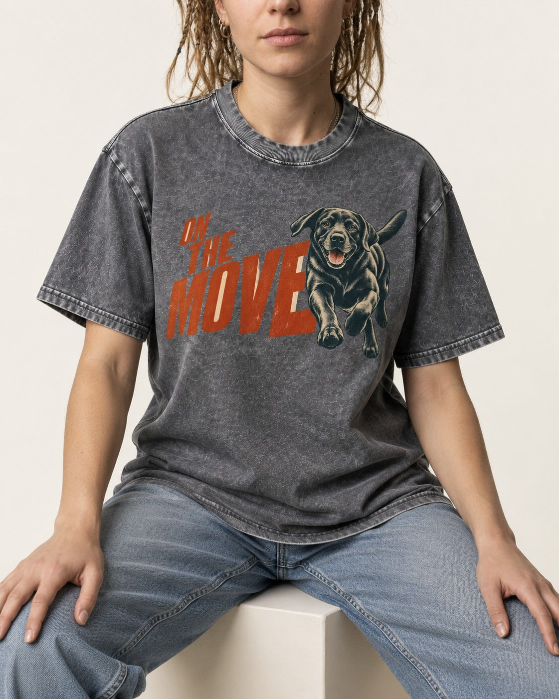 Labrador Retriever On the Move Running Graphic Washed Tee in Gray, worn by a seated model