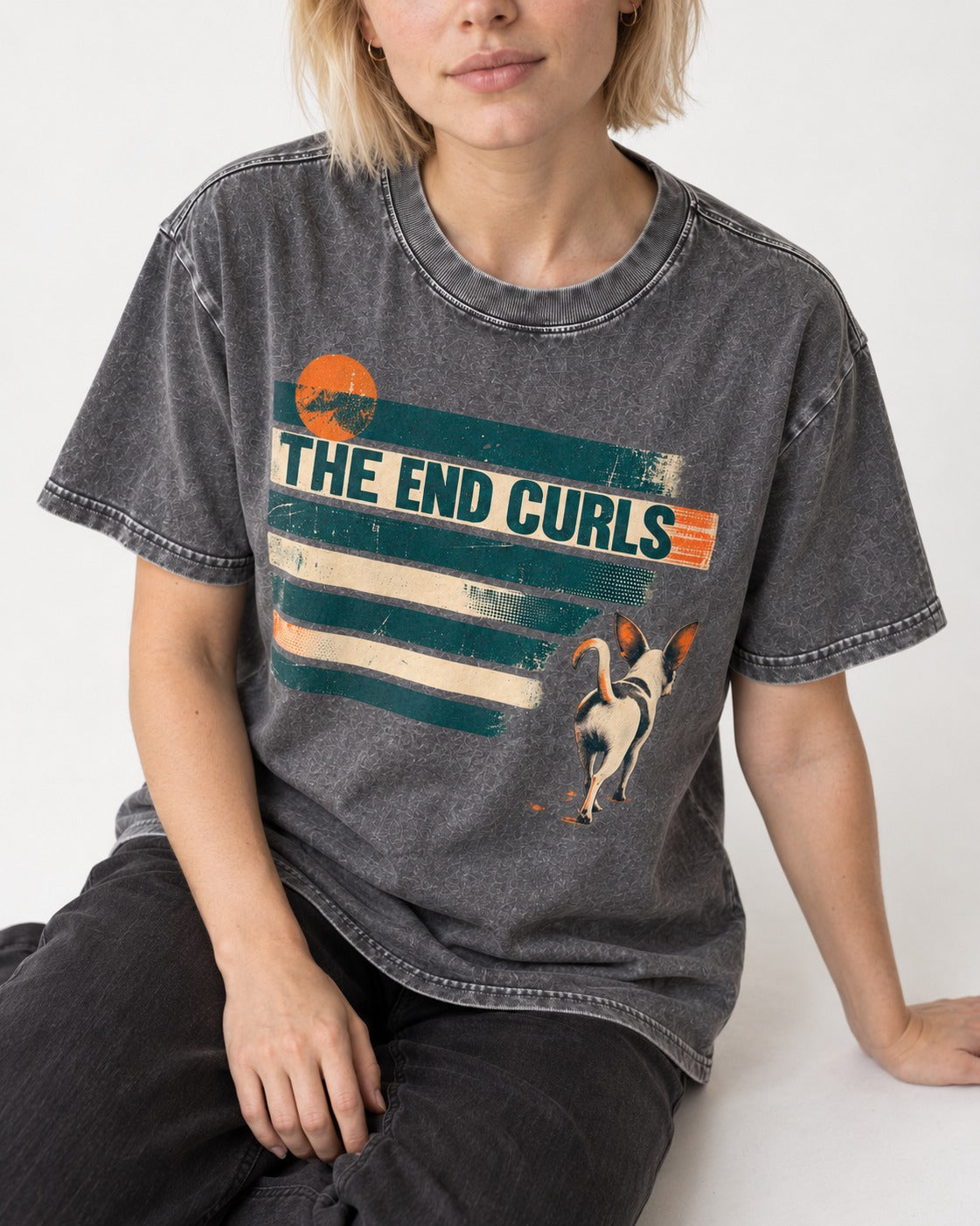 Chihuahua The End Curls Retro Stripe Graphic Washed Tee in Gray, worn by a seated model