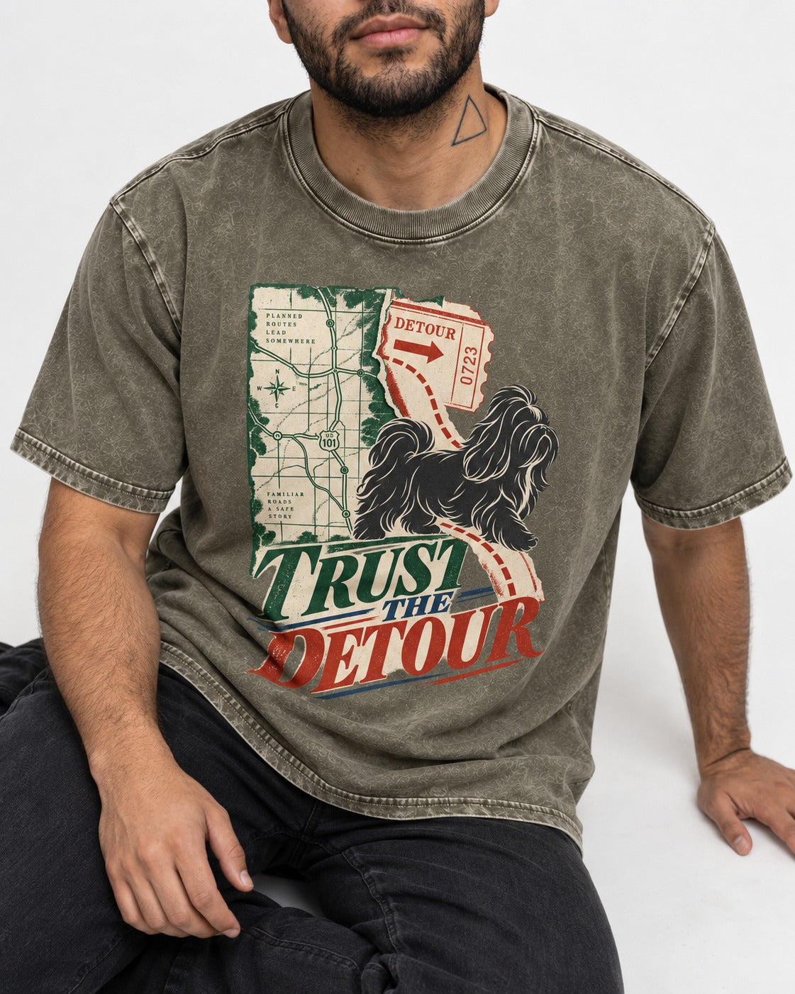 Shih Tzu Trust the Detour Road Map Graphic Washed Tee in Army Green, worn by a seated model