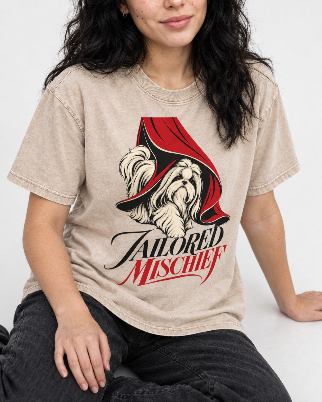 Tailored Mischief Shih Tzu Washed Tee in Apricot, worn by a seated model