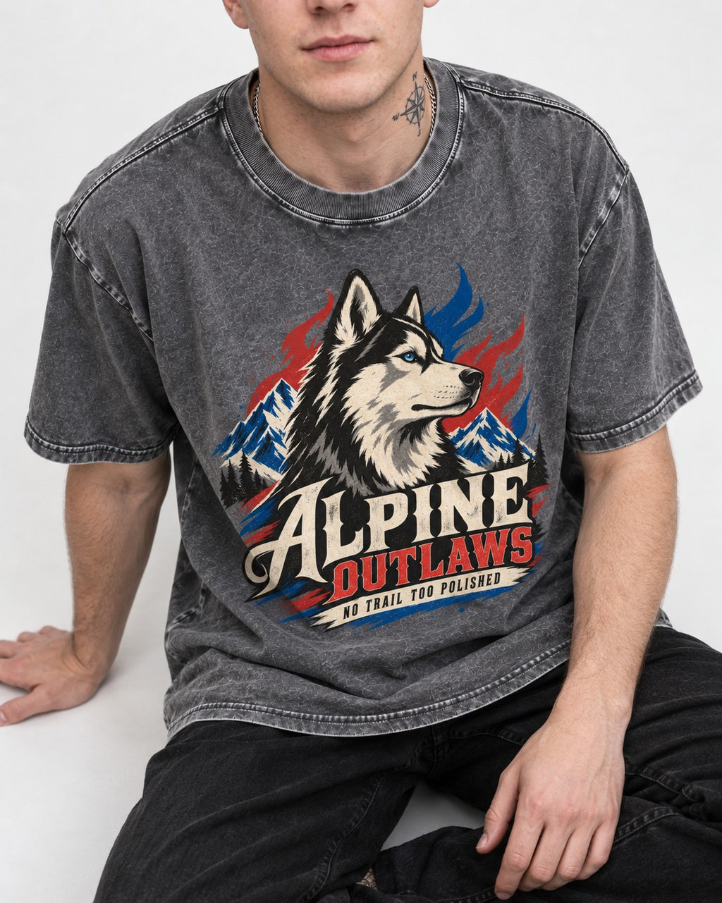 Husky Alpine Outlaws No Trail Too Polished Graphic Washed Tee in Gray, worn by a seated model