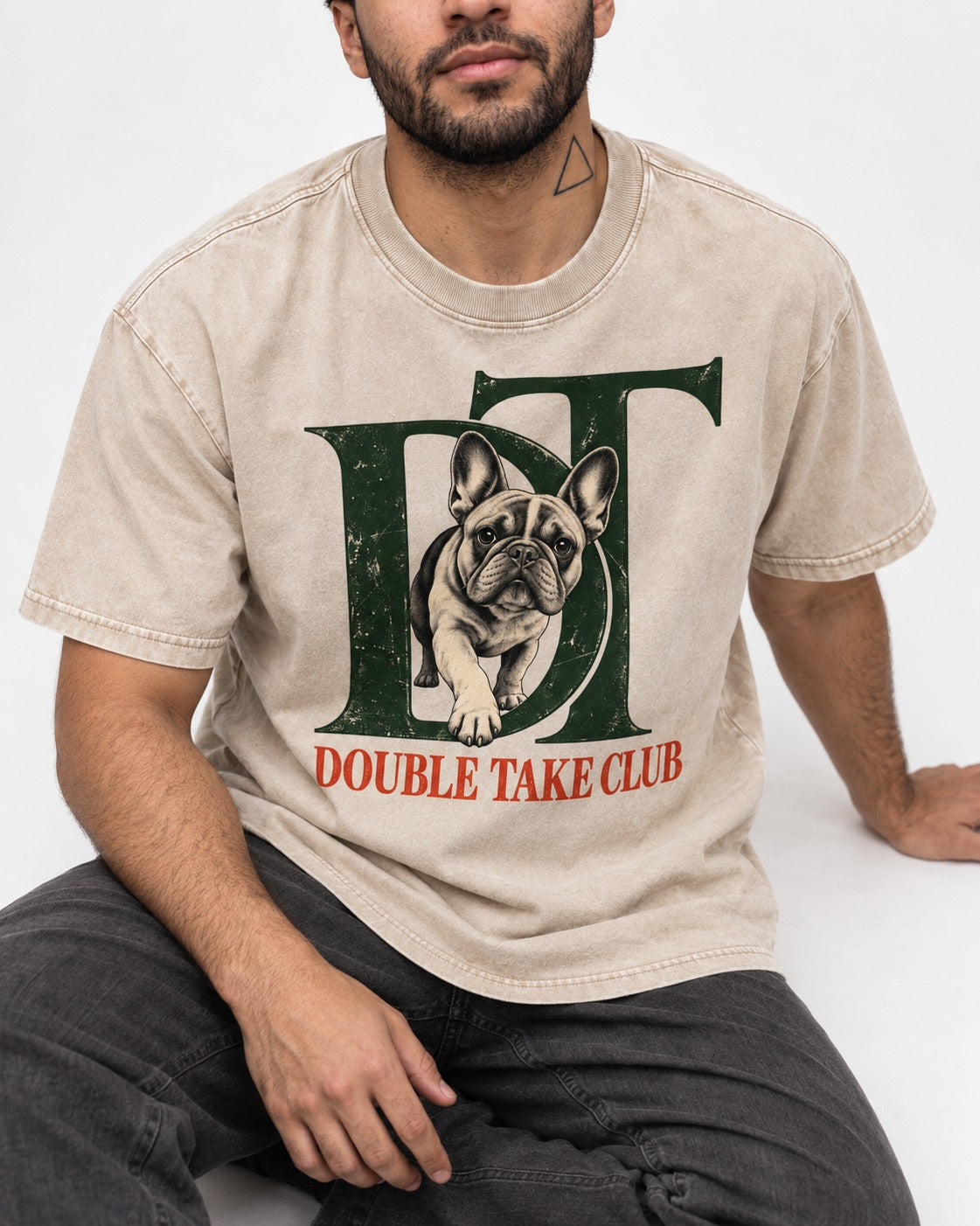 Frenchie Double Take Club Washed Tee in Apricot, worn by a seated model