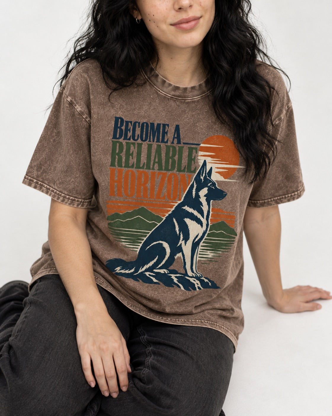 German Shepherd Dog Become a Reliable Horizon Washed Tee in Coffee, worn by a seated model