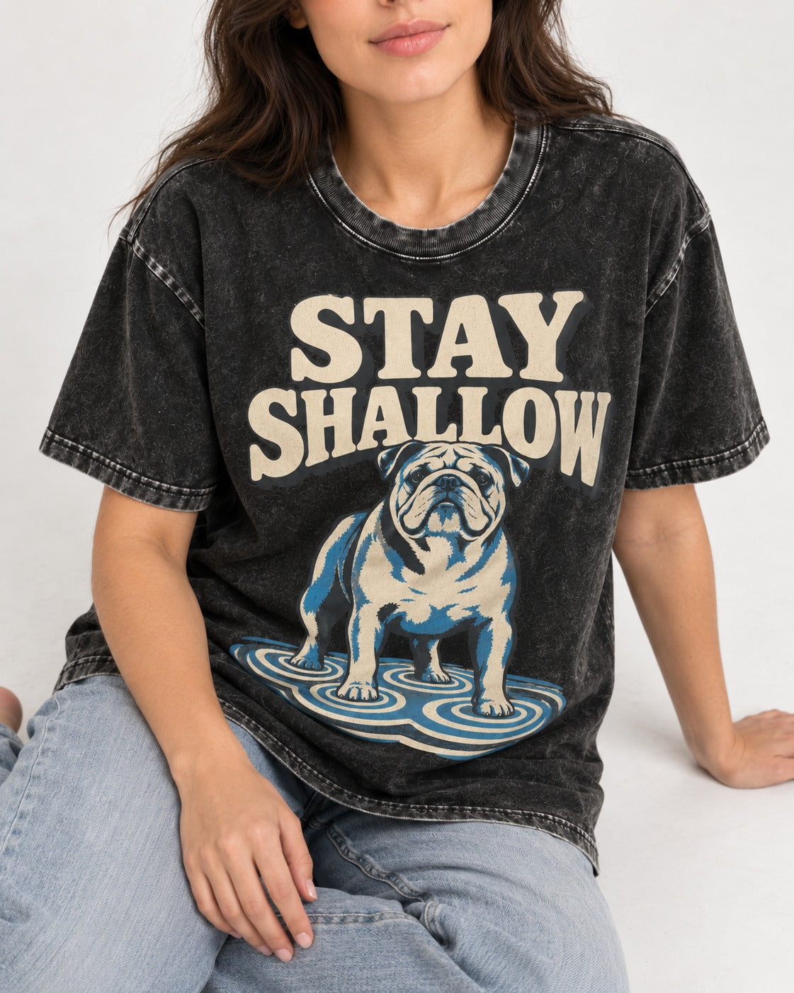 English Bulldog Stay Shallow Ripple Graphic Washed Tee in Black, worn by a seated model