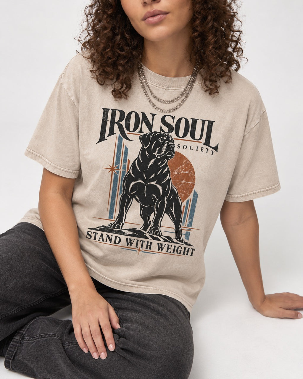 Rottweiler Iron Soul Society Washed Tee in Apricot, worn by a seated model
