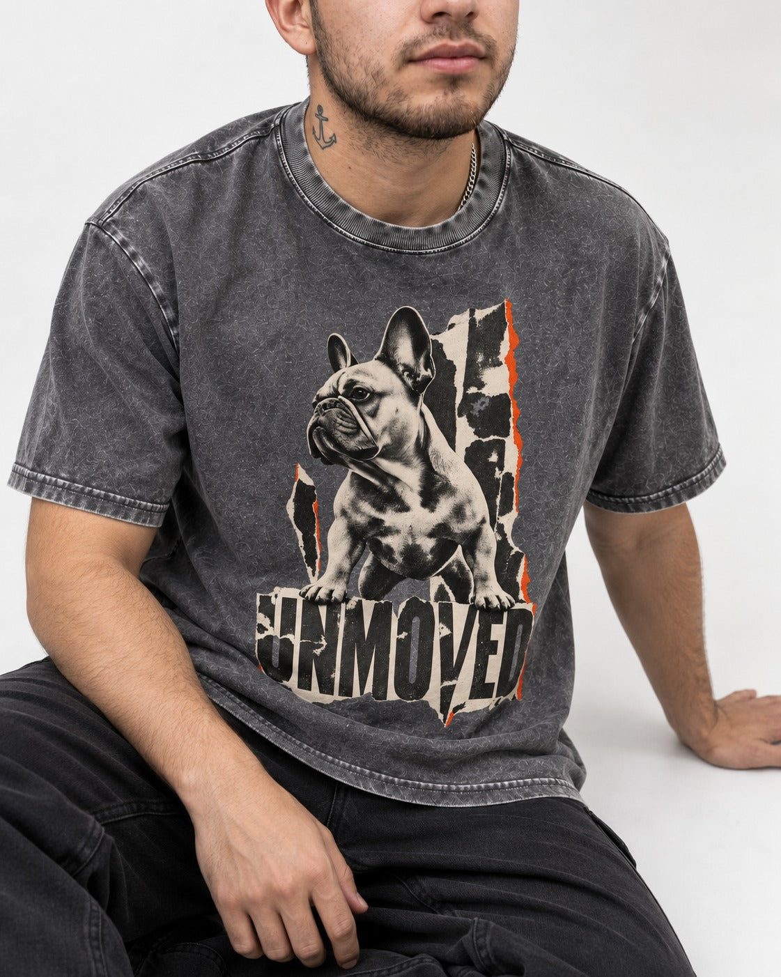 Frenchie Unmoved Torn Poster Graphic Washed Tee in Gray, worn by a seated model