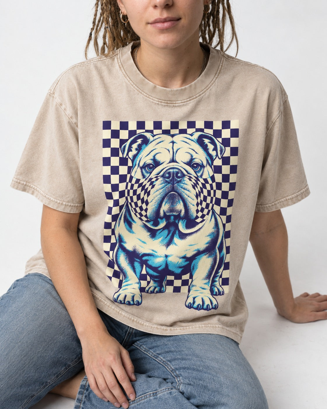English Bulldog Double Take Washed Tee in Apricot, worn by a seated model