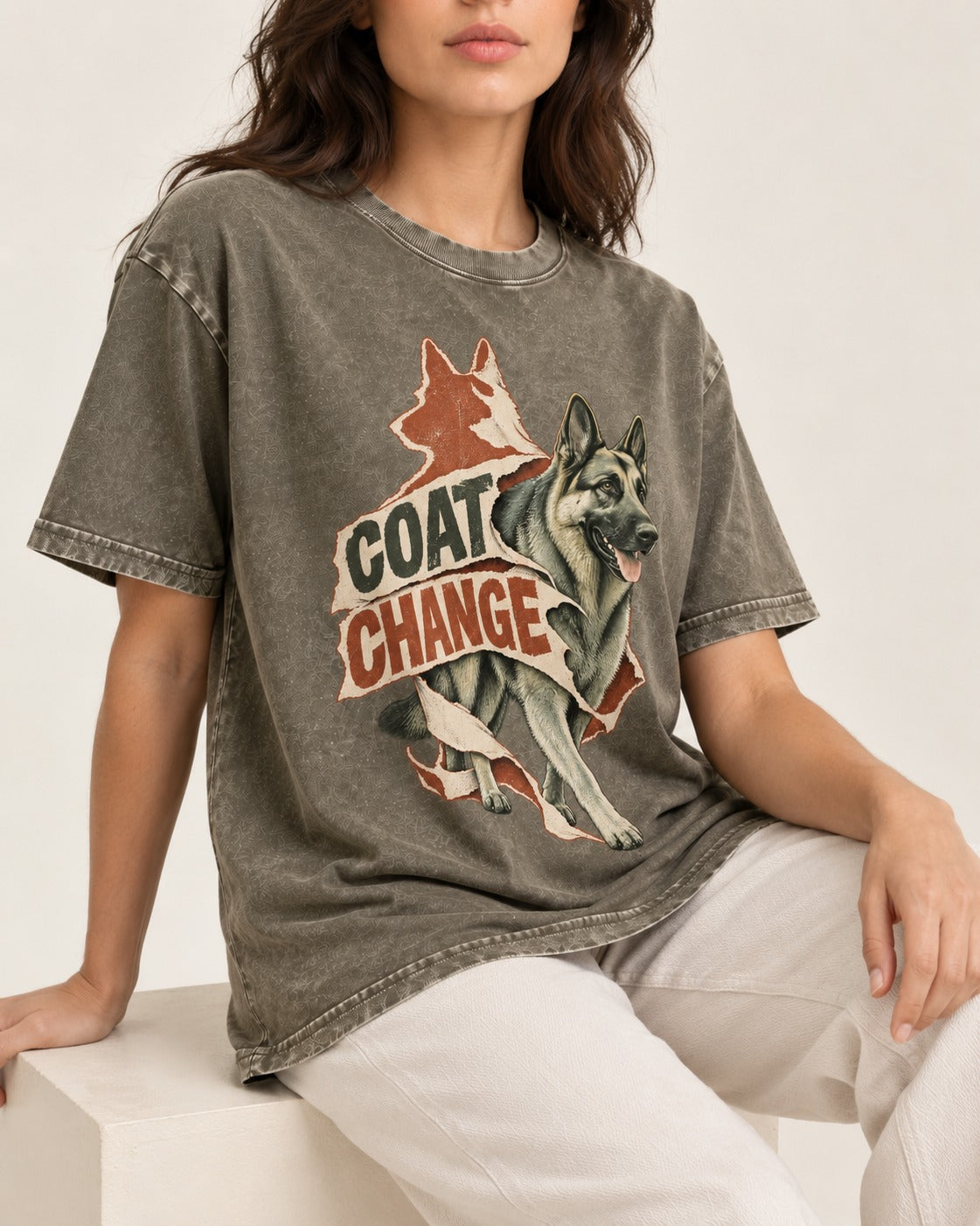 Coat Change Running German Shepherd Dog Ribbon Graphic Washed Tee in Army Green, worn by a seated model