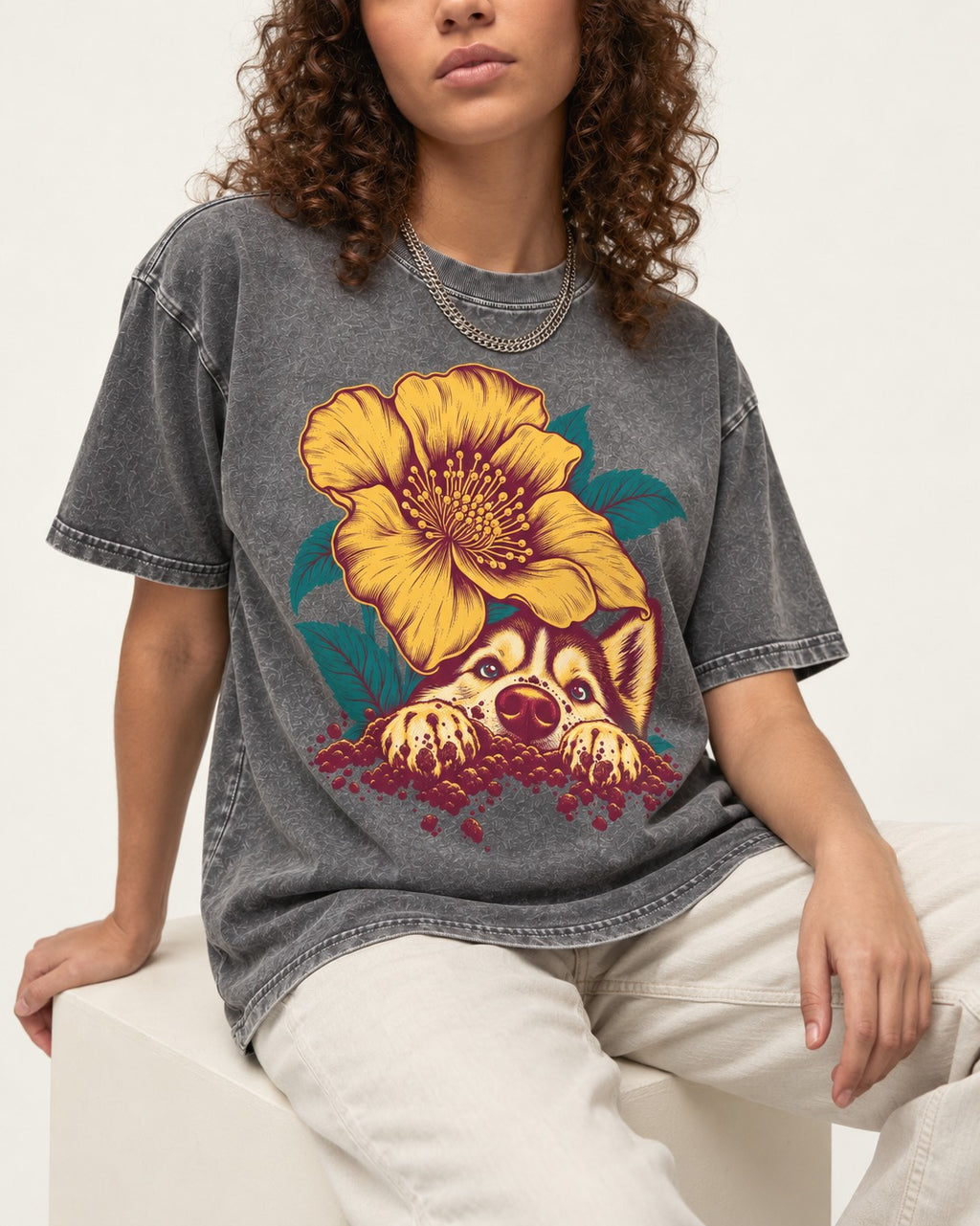 Husky Flower Witness Peeking Floral Graphic Washed Tee in Gray, worn by a seated model