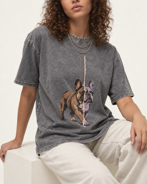 Almost Symmetrical Frenchie Washed Tee in Gray, worn by a seated model