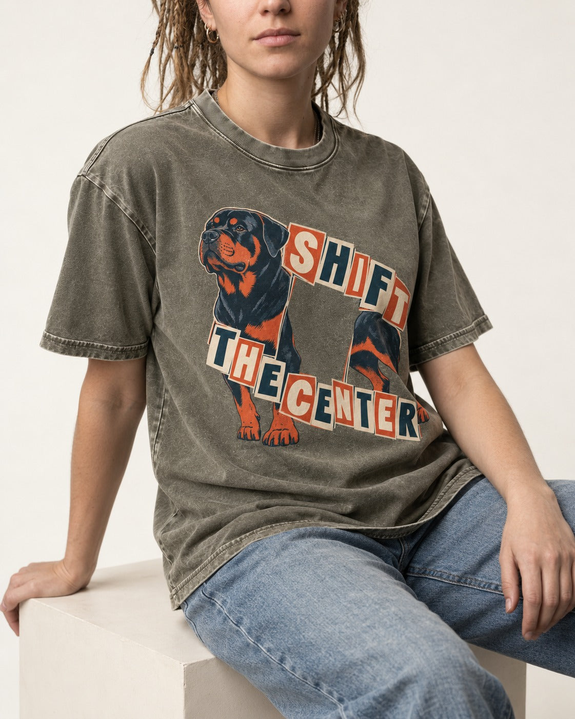 Rottweiler Shift the Center Cutout Letter Graphic Washed Tee in Army Green, worn by a seated model