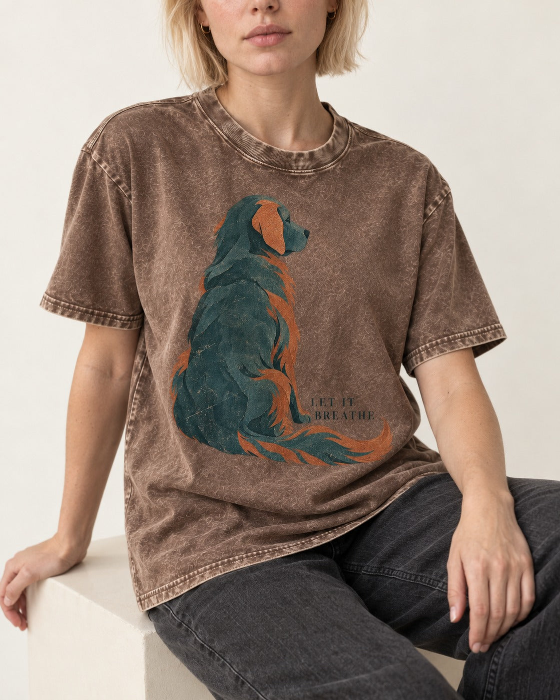 Let It Breathe Golden Retriever Washed Tee in Coffee, worn by a seated model