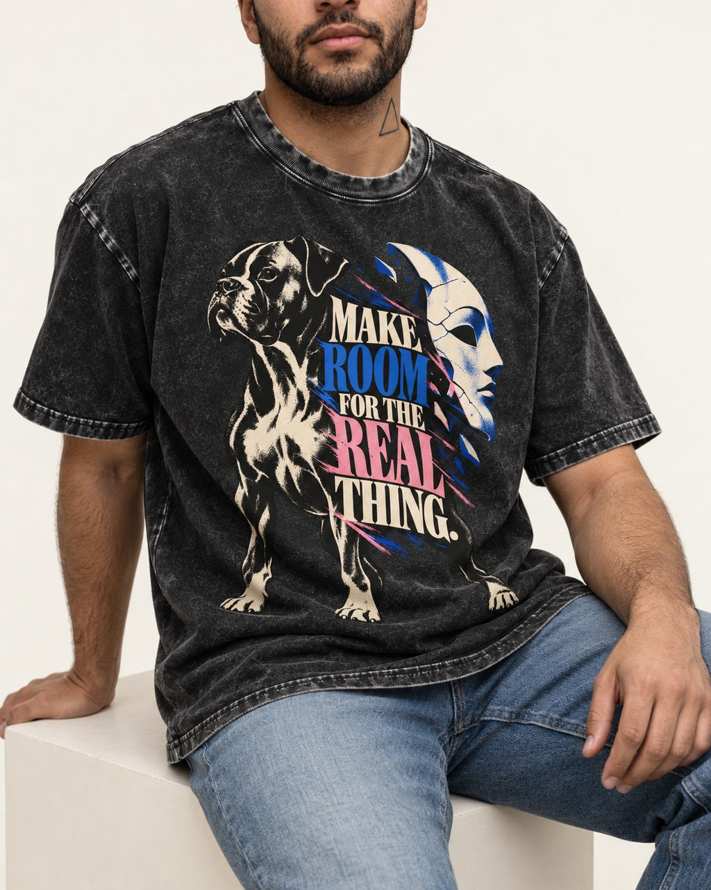 Make Room for the Real Thing Boxer Broken Mask Graphic Washed Tee in Black, worn by a seated model