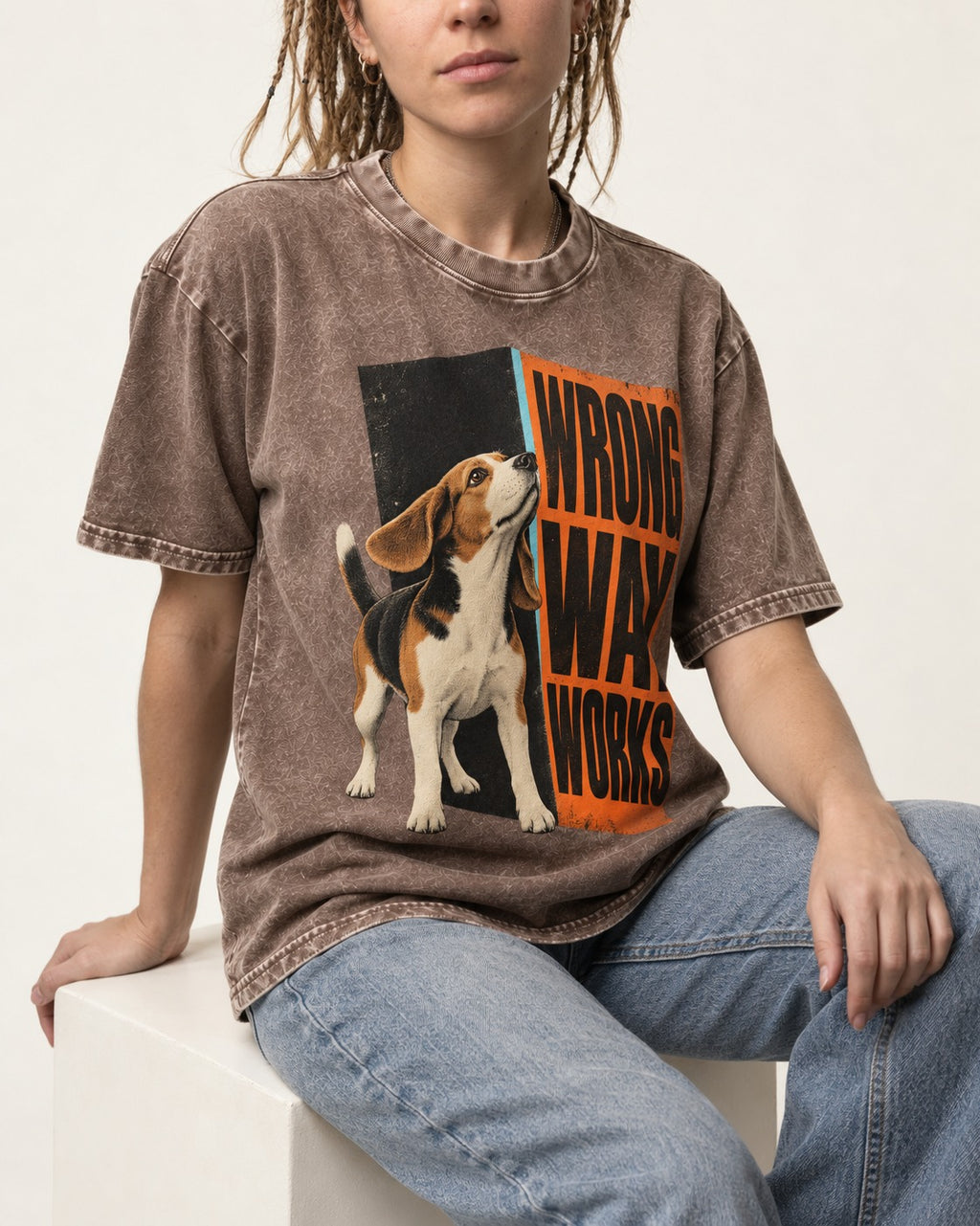 Beagle Wrong Way Works Washed Tee in Coffee, worn by a seated model