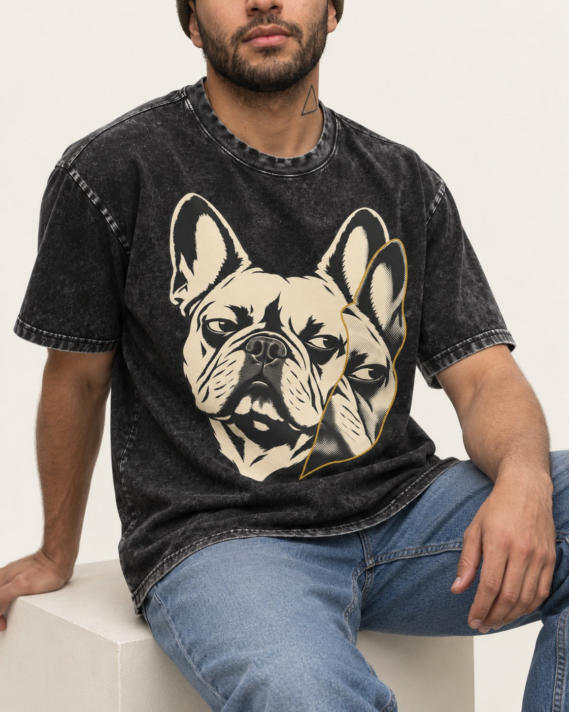 Frenchie Double Crop Side Eye Portrait Graphic Washed Tee in Black, worn by a seated model