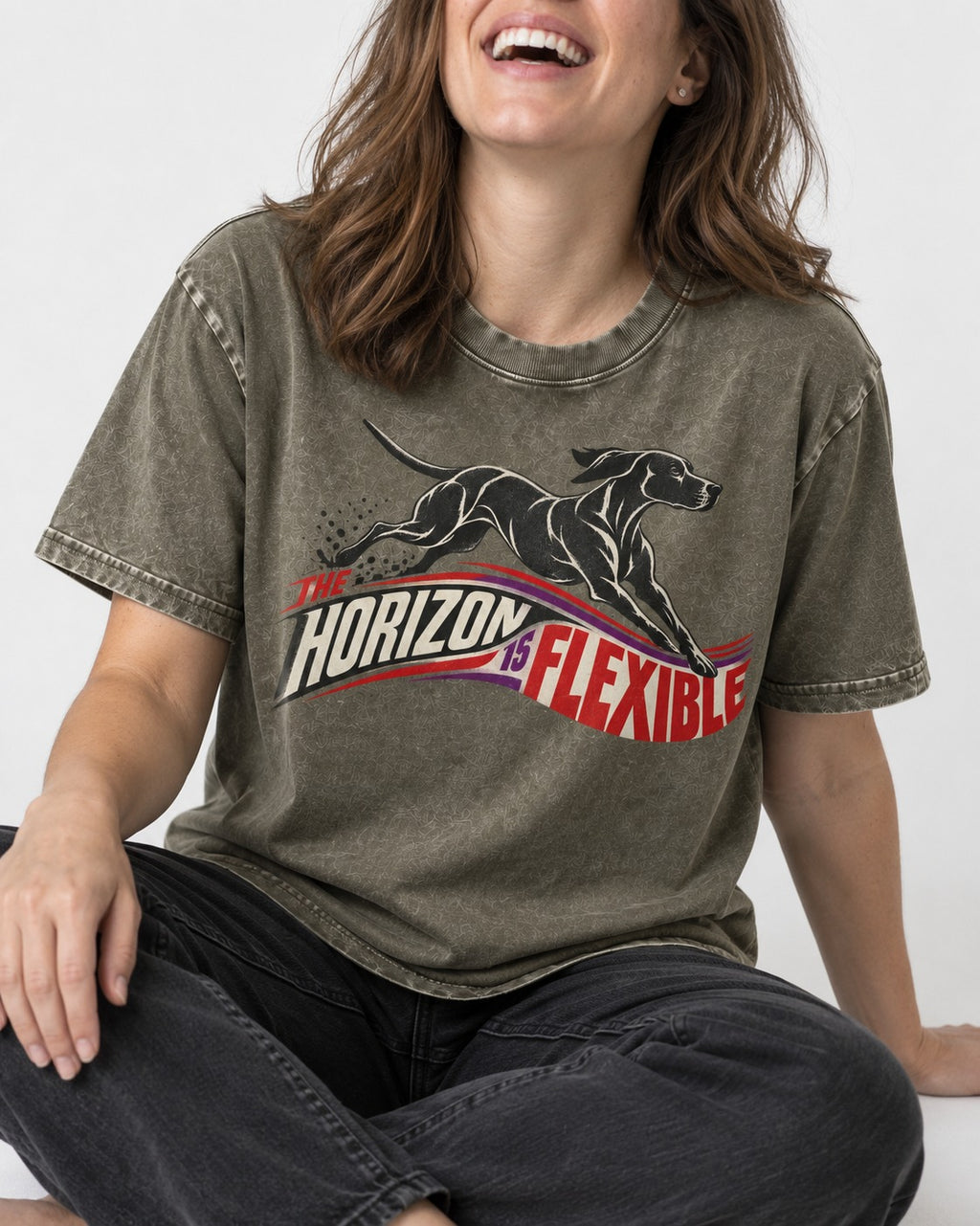 German Shorthaired Pointer The Horizon Is Flexible Racing Ribbon Graphic Washed Tee in Army Green, worn by a seated model