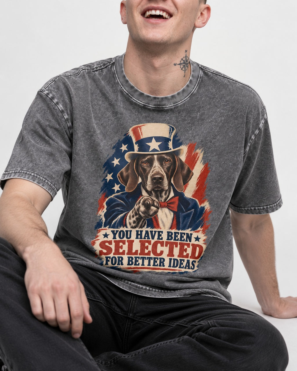 German Shorthaired Pointer You Have Been Selected For Better Ideas Uncle Sam Graphic Washed Tee in Gray, worn by a seated model