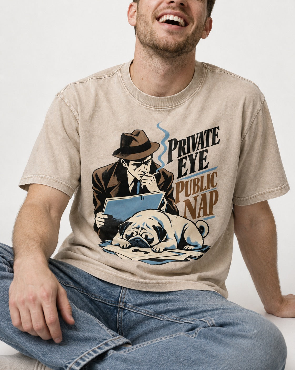 Pug Private Eye Public Nap Washed Tee in Apricot, worn by a seated model