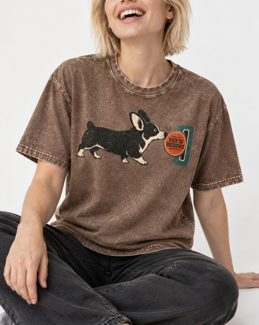 Corgi Pay in Presence Washed Tee in Coffee, worn by a seated model