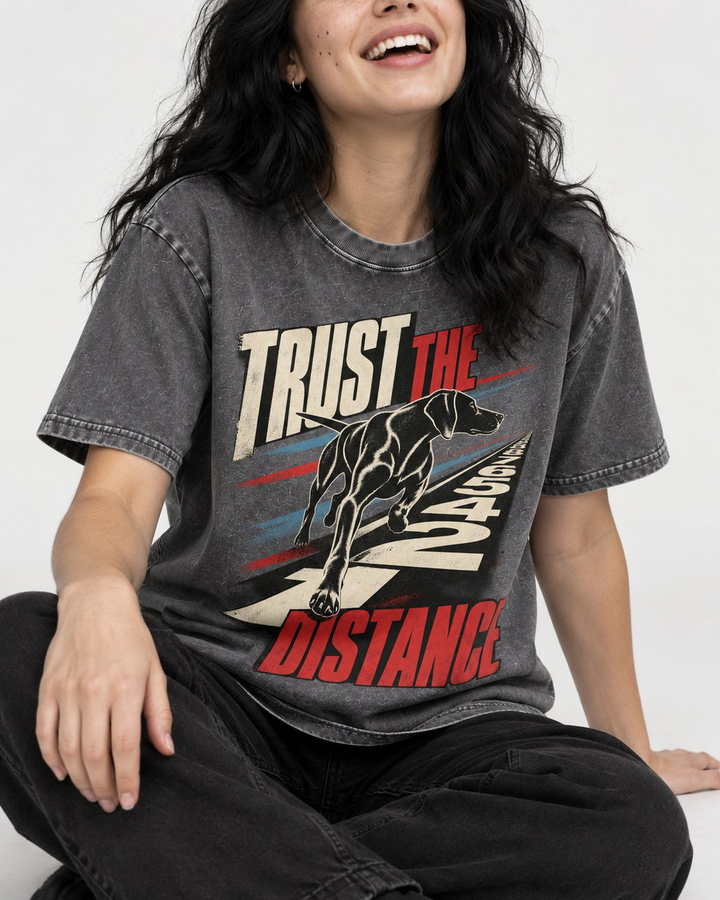 Trust the Distance German Shorthaired Pointer Graphic Washed Tee in Gray, worn by a seated model
