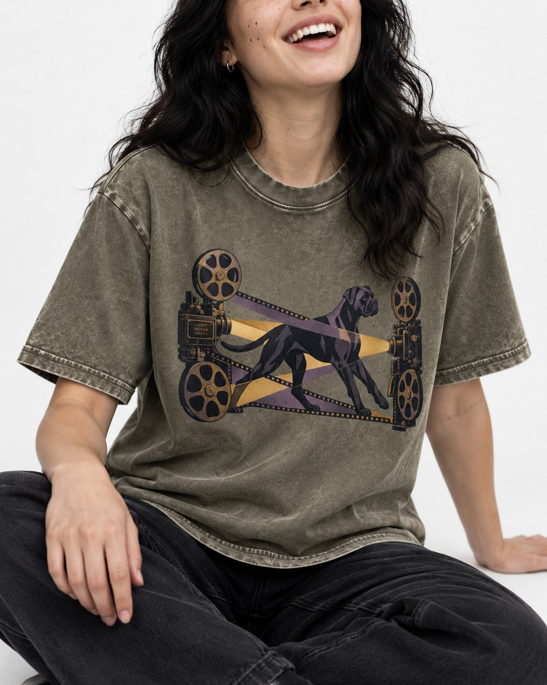 Light Never Waits Boxer Cinema Graphic Washed Tee in Army Green, worn by a seated model
