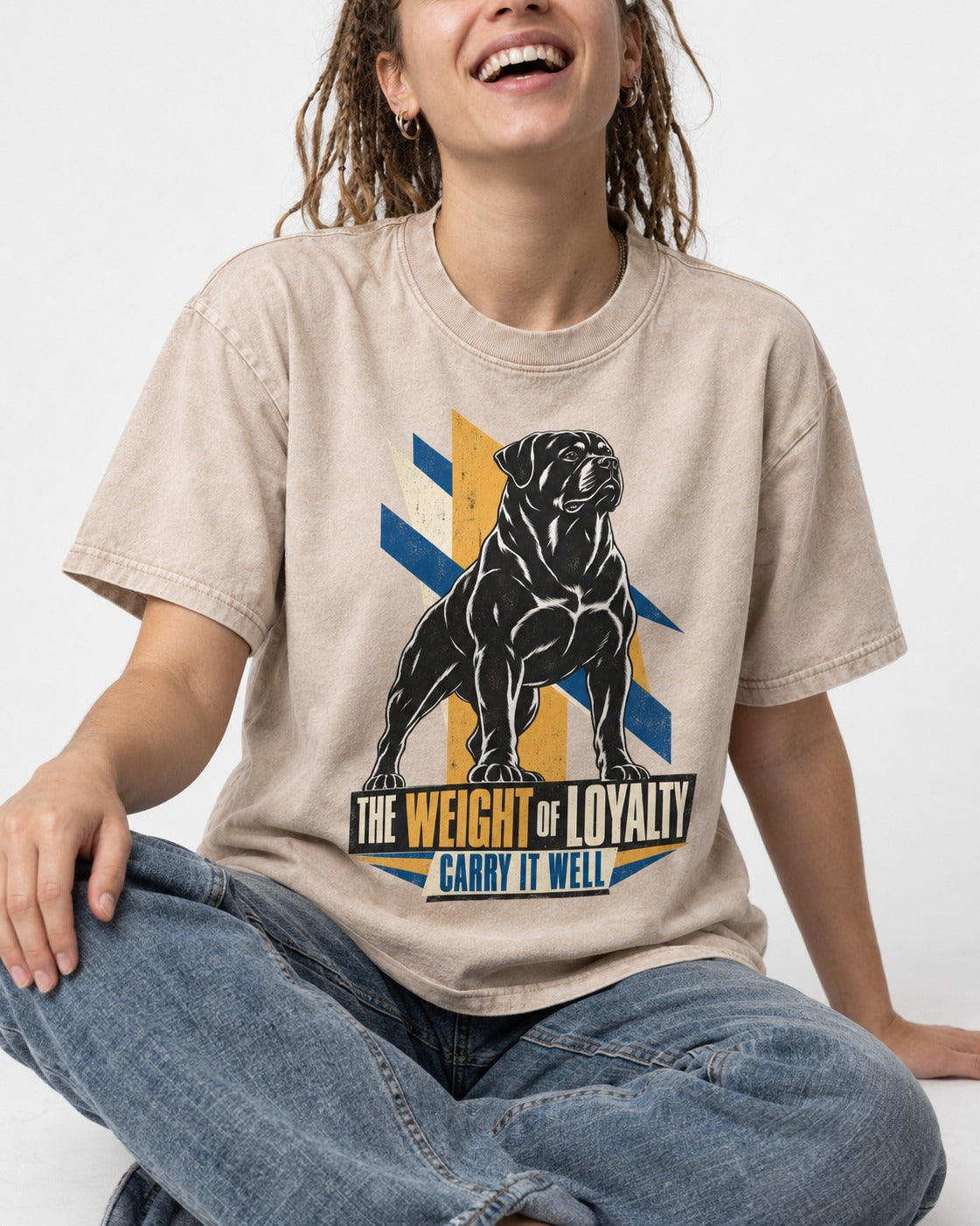 Rottweiler Weight of Loyalty Washed Tee in Apricot, worn by a seated model
