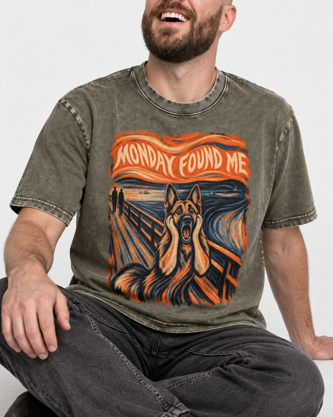 German Shepherd Dog Monday Found Me Scream Graphic Washed Tee in Army Green, worn by a seated model