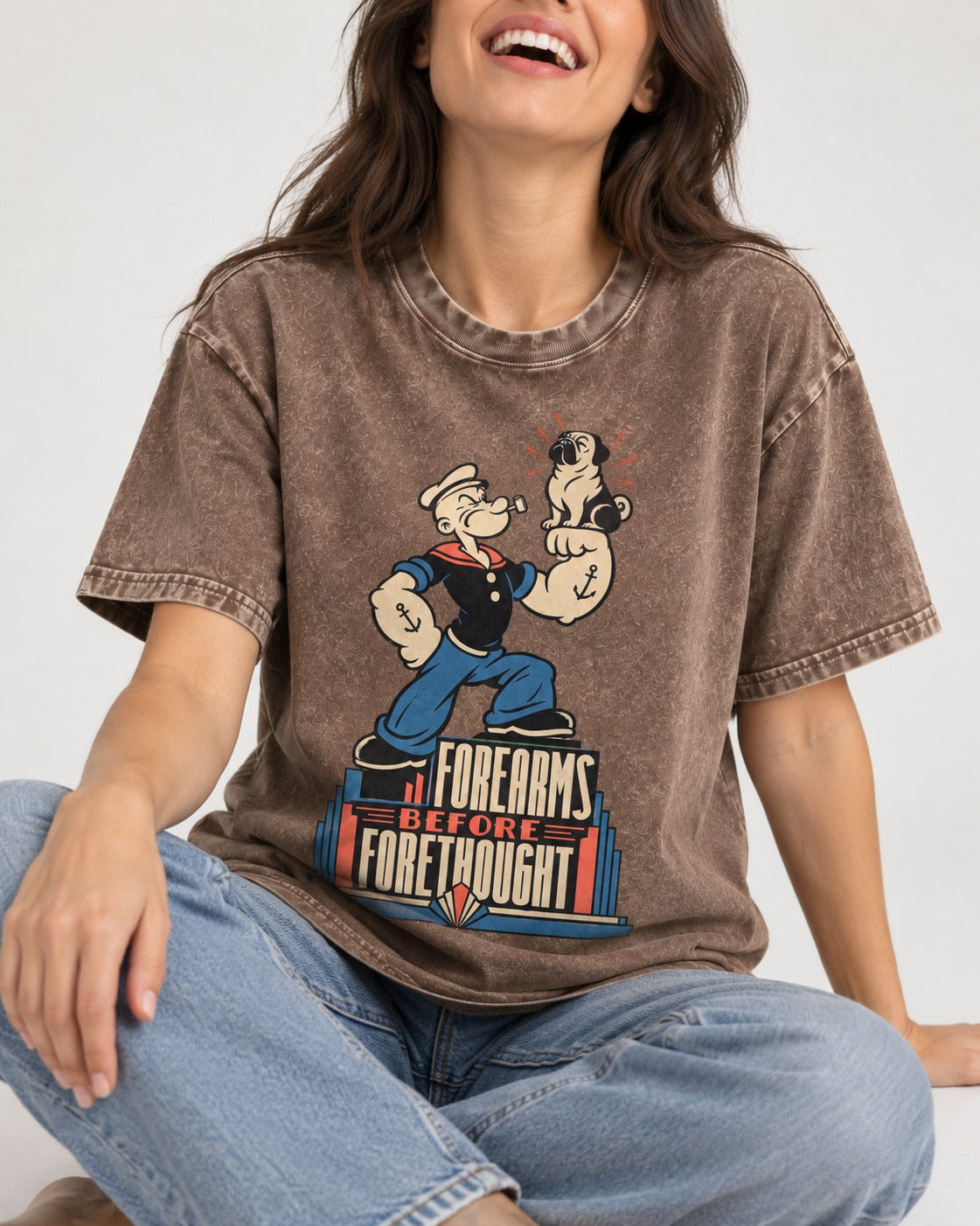 Pug Forearms Before Forethought Washed Tee in Coffee, worn by a seated model